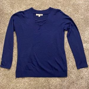 Dark blue sweater with keyhole detail